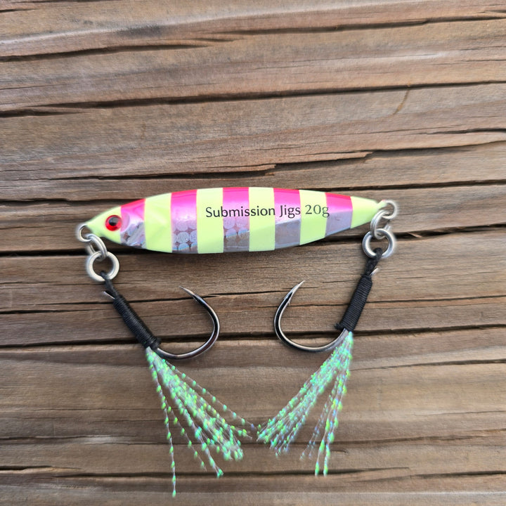 Colorful striped fishing lure with green tail on a wooden surface
