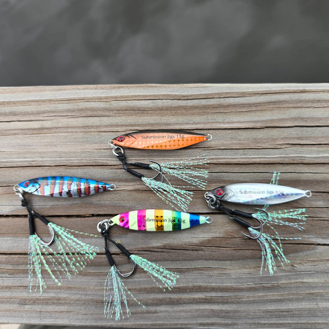 Submission Fishing Mercenary Micro Slow Pitch Jig lineup featuring multiple color options with BKK assist hooks in 10g and 15g sizes.