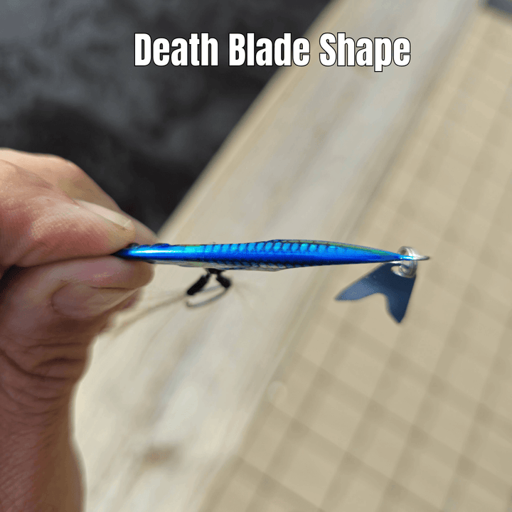 Side profile of the Death Blade slow pitch fishing jig showing its slim body shape