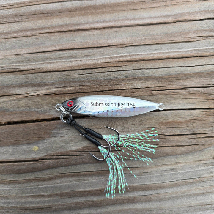 Submission Fishing Micro Mercenary 15g slow pitch jig in Stellar Shad color with saltwater-grade BKK assist hooks and UV flash tassels.